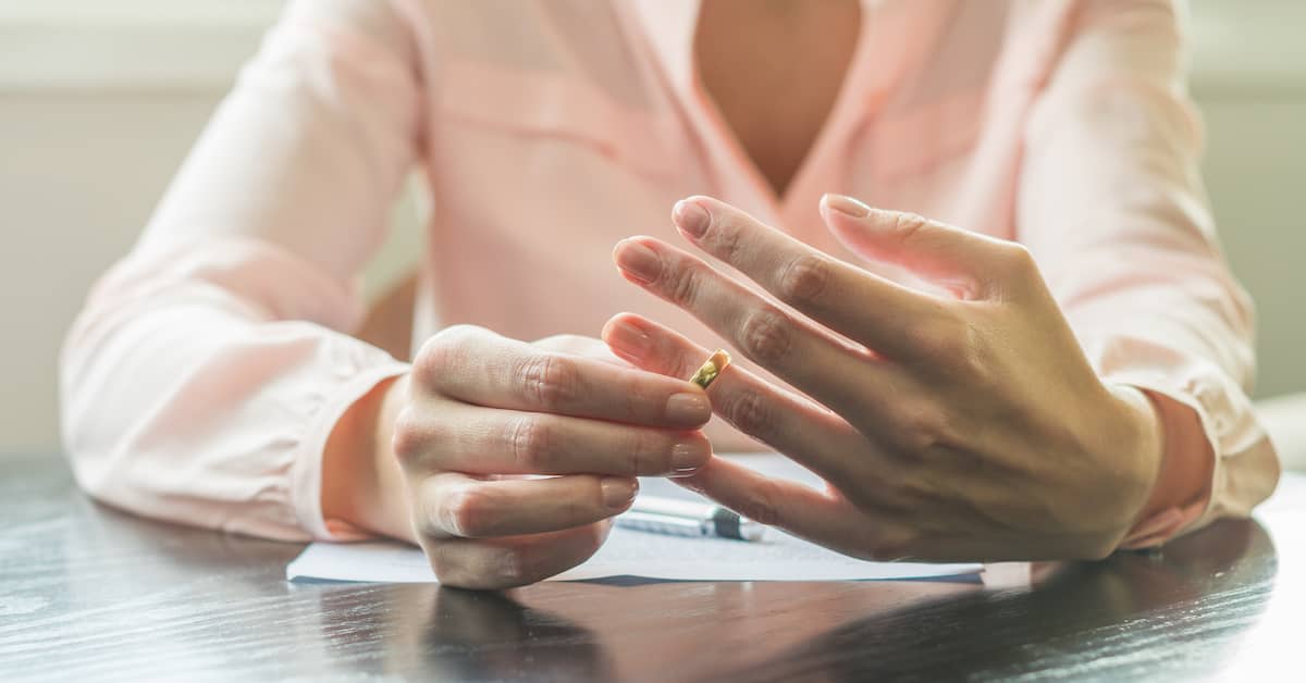 A Woman Removes Her Ring After Divorce | The Bishop Law Group