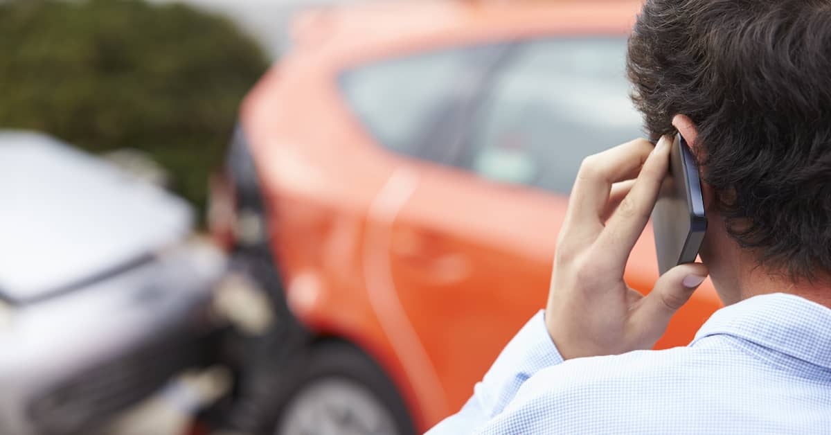 man talks to lawyer after car accident | The Bishop Law Group